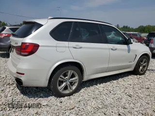 2014 BMW X5 xDrive50i z VIN 5UXKR6C54E0J71803, wystawiony jako Copart lot #60000295 z przebiegiem 130 769 mil mil oraz Czysty tytuł • Clean title. Historia ofert i sprzedaży dostępna na DreamBid. Obrazek 3.