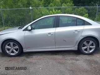 2014 Chevrolet Cruze 2LT z VIN 1G1PE5SB6E7270997, wystawiony jako IAAI lot #42323955 z przebiegiem 146 752 mil mil oraz . Historia ofert i sprzedaży dostępna na DreamBid. Obrazek 14.