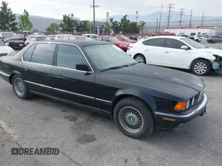 1994 BMW 7 Series with VIN WBAGD8327RDE91414, listed as a IAAI auction lot 42032344 with 138,313 mi miles and . Bid and sale history available at DreamBid. Image 1.