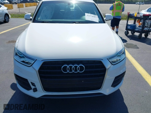 2016 Audi Q3 Premium Plus with VIN WA1BFCFS0GR014028, listed as a IAAI auction lot 42274987 with 64,667 mi miles and . Bid and sale history available at DreamBid. Image 12.