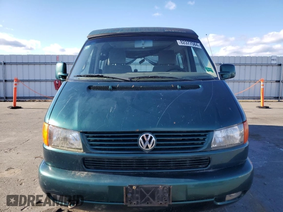 2003 Volkswagen EuroVan MV с VIN WV2NB47033H029173, выставлен на аукционе Copart как лот 82377584 с пробегом 231 083 миль миль и Чистый • Clean title. История ставок и продаж доступна на DreamBid. Изображение 5.