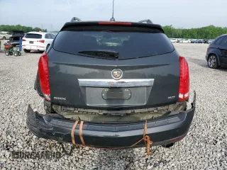 2016 Cadillac SRX Luxury Collection z VIN 3GYFNBE3XGS570448, wystawiony jako Copart lot #54517475 z przebiegiem 119 540 mil mil oraz Szkoda całkowita • Salvage title. Historia ofert i sprzedaży dostępna na DreamBid. Obrazek 6.