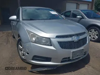 2014 Chevrolet Cruze 1LT z VIN 1G1PC5SB9E7349120, wystawiony jako IAAI lot #42273366 z przebiegiem 176 666 mil mil oraz . Historia ofert i sprzedaży dostępna na DreamBid. Obrazek 6.