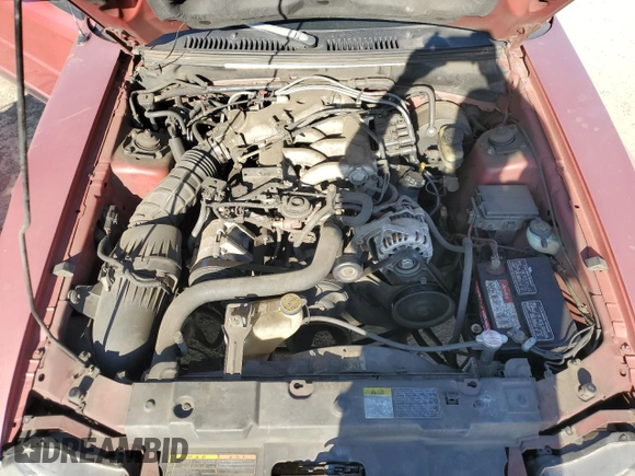 2002 Ford Mustang Deluxe с VIN 1FAFP44422F163443, выставлен на аукционе Copart как лот 57532435 с пробегом 209 356 миль миль и Списание • Salvage title. История ставок и продаж доступна на DreamBid. Изображение 11.