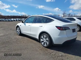 2024 Tesla Model Y with VIN 7SAYGDED2RF089010, listed as a IAAI auction lot 41630222 with 18,366 mi miles and . Bid and sale history available at carsss.com. Image 3.
