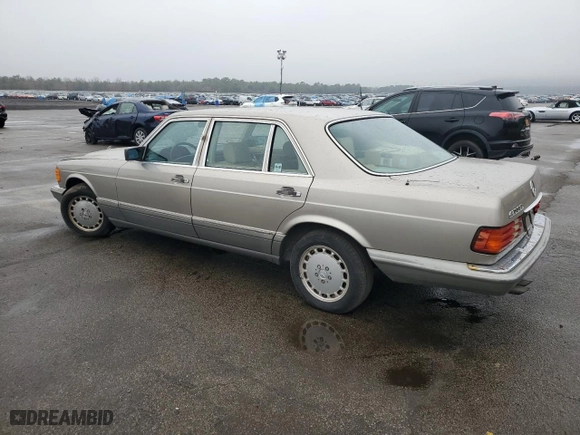 1989 Mercedes-Benz 420 Series 420SEL with VIN WDBCA35E1KA465561, listed as a Copart auction lot 61400034 with 95852 miles and Non Repairable. Bid and sale history available at carsss.com. Image 2.