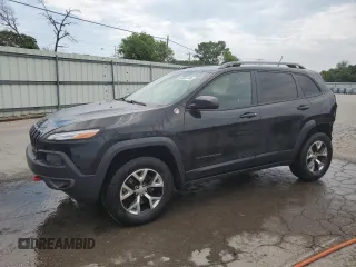 2014 Jeep Cherokee Trailhawk with VIN 1C4PJMBS2EW237725, listed as a Copart auction lot 62666745 with 130,709 mi miles and Salvage title. Bid and sale history available at DreamBid. Image 1.