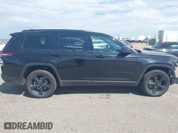 2023 Jeep Grand Cherokee Altitude with VIN 1C4RJJAG4P8817795, listed as a IAAI auction lot 42572709 with 49,468 mi miles and . Bid and sale history available at DreamBid. Image 14.