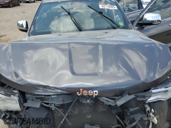 2014 Jeep Grand Cherokee Summit with VIN 1C4RJFJT2EC145918, listed as a Copart auction lot 62718985 with 164,145 mi miles and Clean title. Bid and sale history available at DreamBid. Image 12.