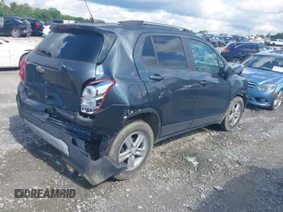 2021 Chevrolet Trax LT with VIN KL7CJLSB7MB325696, listed as a IAAI auction lot 42244114 with Not provided miles and . Bid and sale history available at DreamBid. Image 4.