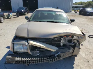 2003 Ford Police Interceptor Street Appear z VIN 2FAFP71W03X104811, wystawiony jako Copart lot #49307995 z przebiegiem 242 937 mil mil oraz Szkoda całkowita • Salvage title. Historia ofert i sprzedaży dostępna na DreamBid. Obrazek 5.