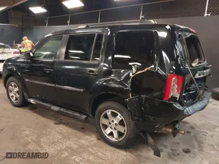 2011 Honda Pilot Touring with VIN 5FNYF4H97BB099528, listed as a IAAI auction lot 41721800 with 132,979 mi miles. Bid and sale history available at carsss.com. Image 3.
