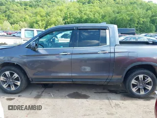 2018 Honda Ridgeline RTL-E with VIN 5FPYK3F74JB004162, listed as a IAAI auction lot 42180687 with 160,805 mi miles and . Bid and sale history available at DreamBid. Image 15.