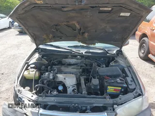 2001 Toyota Camry CE z VIN 4T1BG22K51U053555, wystawiony jako IAAI lot #42042788 z przebiegiem 279 347 mil mil oraz . Historia ofert i sprzedaży dostępna na DreamBid. Obrazek 10.