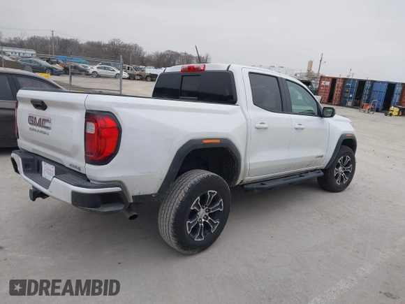 2023 GMC Canyon 4WD AT4 with VIN 1GTP6DEK0P1221777, listed as a IAAI auction lot 41564754 with 21,974 mi miles. Bid and sale history available at carsss.com. Image 13.