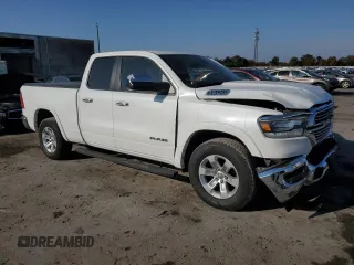 2019 Ram 1500 Laramie with VIN 1C6SRFDTXKN674871, listed as a Copart auction lot 77143314 with 30,418 mi miles and Salvage Title. Bid and sale history available at carsss.com. Image 4.