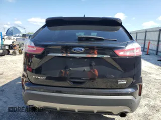 2020 Ford Edge SEL с VIN 2FMPK3J93LBA57329, выставлен на аукционе Copart как лот 56996185 с пробегом 120 631 миль миль и На запчасти • Non repairable. История ставок и продаж доступна на DreamBid. Изображение 6.