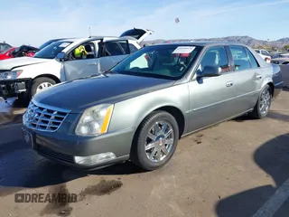 2008 Cadillac DTS 1SA z VIN 1G6KD57Y08U186328, wystawiony jako IAAI lot #41618974 z przebiegiem 71 920 mil mil oraz . Historia ofert i sprzedaży dostępna na DreamBid. Obrazek 17.