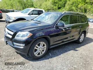 2014 Mercedes-Benz GL 450 z VIN 4JGDF7CE1EA381306, wystawiony jako Copart lot #56232895 z przebiegiem 129 957 mil mil oraz Tytuł czysty. Historia ofert i sprzedaży dostępna na DreamBid. Obrazek 1.