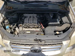 2005 Kia Sportage LX with VIN KNDJE723657067187, listed as a Copart auction lot 57403525 with 228,648 mi miles and Clean title. Bid and sale history available at DreamBid. Image 12.