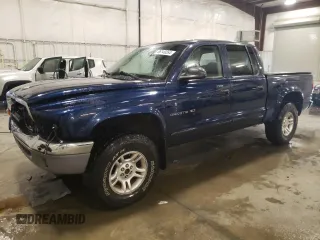 2002 Dodge Dakota SLT with VIN 1B7HG48N12S653207, listed as a Copart auction lot 86149264 with 215,021 mi miles and Salvage Title. Bid and sale history available at carsss.com. Image 1.