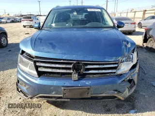 2020 Volkswagen Tiguan SE z VIN 3VV3B7AXXLM150387, wystawiony jako Copart lot #50516415 z przebiegiem 31 419 mil mil oraz Szkody całkowita. Historia ofert i sprzedaży dostępna na DreamBid. Obrazek 5.