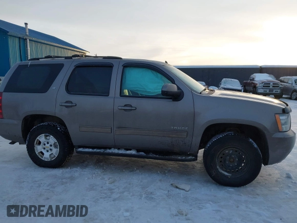 2013 Chevrolet Tahoe LT with VIN 1GNSKBE0XDR296094, listed as a IAAI auction lot 41448160 with 167,165 mi miles and . Bid and sale history available at DreamBid. Image 13.