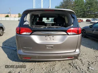2017 Chrysler Pacifica Touring with VIN 2C4RC1DG1HR536856, listed as a Copart auction lot 58973155 with 142,520 mi miles and Salvage title. Bid and sale history available at DreamBid. Image 6.