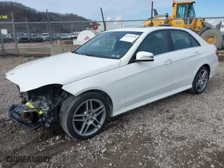 2014 Mercedes-Benz E-Class E 350 Luxury with VIN WDDHF8JBXEA852122, listed as a IAAI auction lot 41659079 with 60,991 mi miles. Bid and sale history available at carsss.com. Image 18.