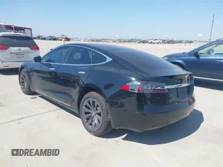 2020 Tesla Model S Long Range with VIN 5YJSA1E27LF397346, listed as a IAAI auction lot 40579015 with 43,779 mi miles and . Bid and sale history available at DreamBid. Image 3.