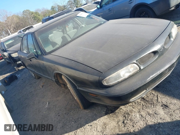 1998 Oldsmobile 88 LS z VIN 1G3HN52K2W4849130, wystawiony jako IAAI lot #41496592 z przebiegiem Nie podano mil oraz . Historia ofert i sprzedaży dostępna na DreamBid. Obrazek 1.