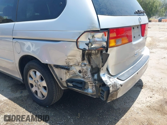 2004 Honda Odyssey EX-L with VIN 5FNRL18774B028164, listed as a IAAI auction lot 42454877 with 135,720 mi miles and . Bid and sale history available at DreamBid. Image 6.