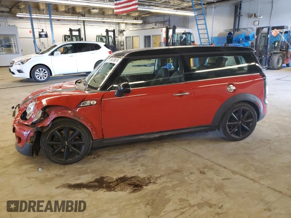 2014 MINI Clubman S z VIN WMWZG3C52ET800765, wystawiony jako Copart lot #76470874 z przebiegiem 103 971 mil mil oraz Szkoda całkowita • Salvage title. Historia ofert i sprzedaży dostępna na DreamBid. Obrazek 1.
