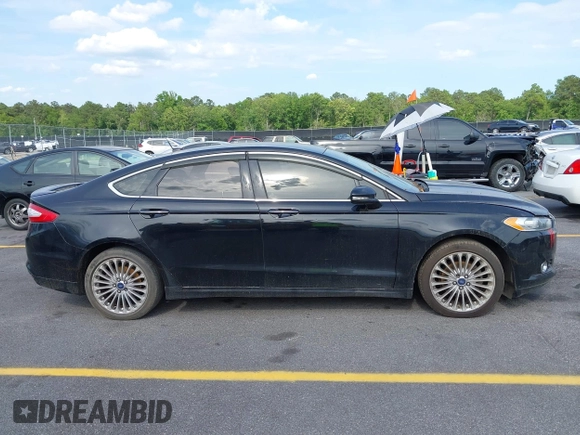 2016 Ford Fusion Titanium with VIN 3FA6P0K90GR179528, listed as a IAAI auction lot 42181213 with 230,264 mi miles. Bid and sale history available at carsss.com. Image 13.
