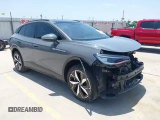 2023 Volkswagen ID.4 Pro S z VIN 1V2GNPE80PC006590, wystawiony jako IAAI lot #42178241 z przebiegiem 17 177 mil mil oraz . Historia ofert i sprzedaży dostępna na DreamBid. Obrazek 1.