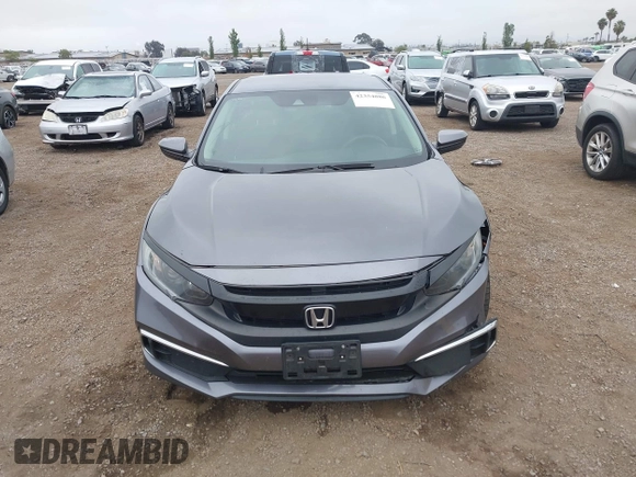 2020 Honda Civic LX with VIN 2HGFC2F63LH567698, listed as a IAAI auction lot 42354886 with 70,977 mi miles and . Bid and sale history available at DreamBid. Image 13.