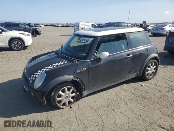 2004 MINI Hardtop with VIN WMWRC33464TJ62893, listed as a Copart auction lot 51905565 with 141,958 mi miles and Salvage Title. Bid and sale history available at DreamBid. Image 1.