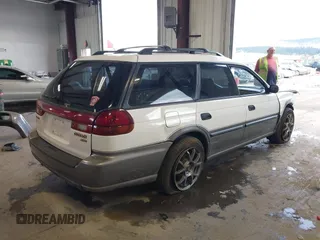 1999 Subaru Legacy Outback with VIN 4S3BG6850X7659883, listed as a IAAI auction lot 42233605 with 147,606 mi miles and . Bid and sale history available at DreamBid. Image 4.