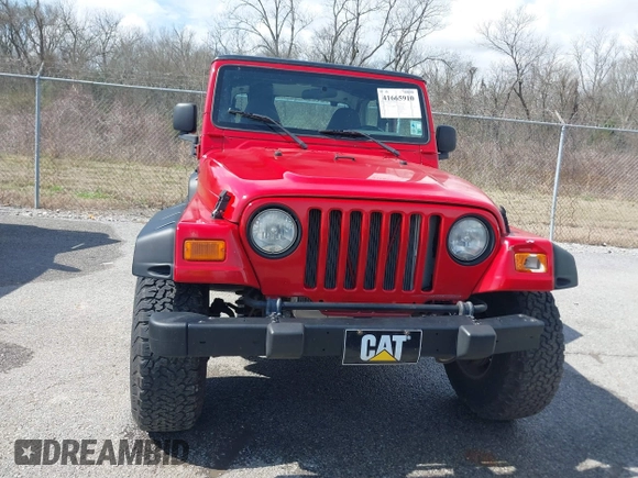 2002 Jeep Wrangler X with VIN 1J4FA39S02P739211, listed as a IAAI auction lot 41665910 with 144,118 mi miles. Bid and sale history available at carsss.com. Image 12.