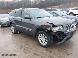 2014 Jeep Grand Cherokee Laredo with VIN 1C4RJFAG7EC505073, listed as a IAAI auction lot 41664621 with 193,581 mi miles. Bid and sale history available at carsss.com. Image 1.