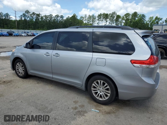 2011 Toyota Sienna XLE AAS with VIN 5TDYK3DC2BS011343, listed as a Copart auction lot 61223675 with 187,206 mi miles and Salvage title. Bid and sale history available at DreamBid. Image 2.