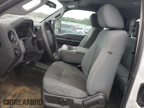 2014 Ford F-250 XLT with VIN 1FT7X2A65EEA98638, listed as a Copart auction lot 60948084 with 319,812 mi miles and Salvage title. Bid and sale history available at DreamBid. Image 7.
