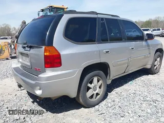 2005 GMC Envoy SLE with VIN 1GKDS13S652390259, listed as a IAAI auction lot 41825258 with 162,172 mi miles and . Bid and sale history available at DreamBid. Image 4.