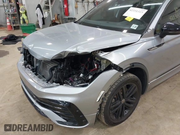 2022 Volkswagen Tiguan SE R-Line Black с VIN 3VV8B7AX8NM044884, выставлен на аукционе IAAI как лот 42331323 с пробегом 45 945 миль миль и . История ставок и продаж доступна на DreamBid. Изображение 6.