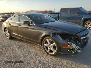 2014 Mercedes-Benz CLS-Class CLS 550 with VIN WDDLJ7DB3EA117836, listed as a Copart auction lot 77133604 with 98,489 mi miles and Salvage Title. Bid and sale history available at carsss.com. Image 4.