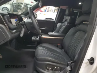 2023 Rivian R1S Adventure z VIN 7PDSGABA2PN013659, wystawiony jako Copart lot #53475945 z przebiegiem 13 928 mil mil oraz Szkody całkowita. Historia ofert i sprzedaży dostępna na DreamBid. Obrazek 7.
