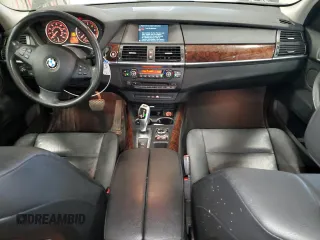 2011 BMW X5 35i z VIN 5UXZV4C52BL743475, wystawiony jako Copart lot #56238615 z przebiegiem 218 738 mil mil oraz Szkoda całkowita • Salvage title. Historia ofert i sprzedaży dostępna na DreamBid. Obrazek 8.