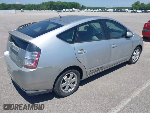 2005 Toyota Prius z VIN JTDKB20U657012346, wystawiony jako IAAI lot #42275718 z przebiegiem 180 851 mil mil oraz . Historia ofert i sprzedaży dostępna na DreamBid. Obrazek 4.
