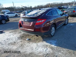 2013 Honda Crosstour EX z VIN 5J6TF3H33DL000648, wystawiony jako IAAI lot #41304910 z przebiegiem 147 670 mil mil oraz . Historia ofert i sprzedaży dostępna na DreamBid. Obrazek 4.