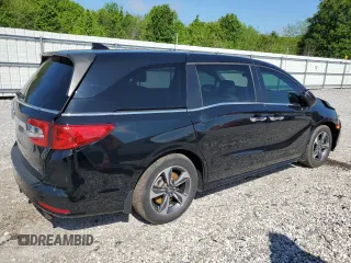 2019 Honda Odyssey Touring with VIN 5FNRL6H84KB014970, listed as a Copart auction lot 53571835 with 116,219 mi miles and Salvage title. Bid and sale history available at DreamBid. Image 3.
